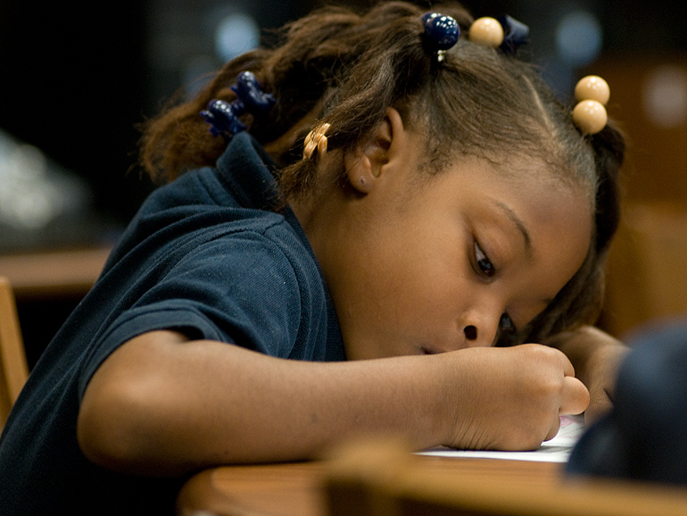 girl doing her homework