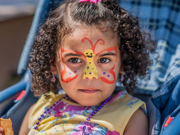 girl with butterfly face paint